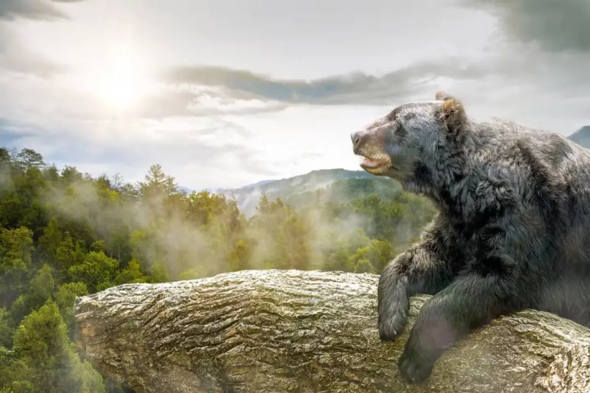 A majestic bear stands atop a fallen tree log, set against the backdrop of a sweeping mountain range beneath an expansive sky. The scene captures the wild nature and awe-inspiring beauty of the Smoky Mountains, evoking the thrill of wildlife encounters and outdoor adventure.